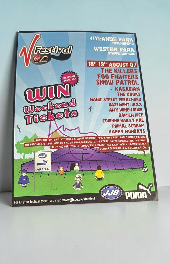 Amy Winehouse Signed V Festival Promotional Flyer: This lot is a promotional flyer (V Festival 18th-19th August 2007), autographed in purple sharpie on the front of the flyer by Amy Winehouse. Item comes with third party authentication including inter
