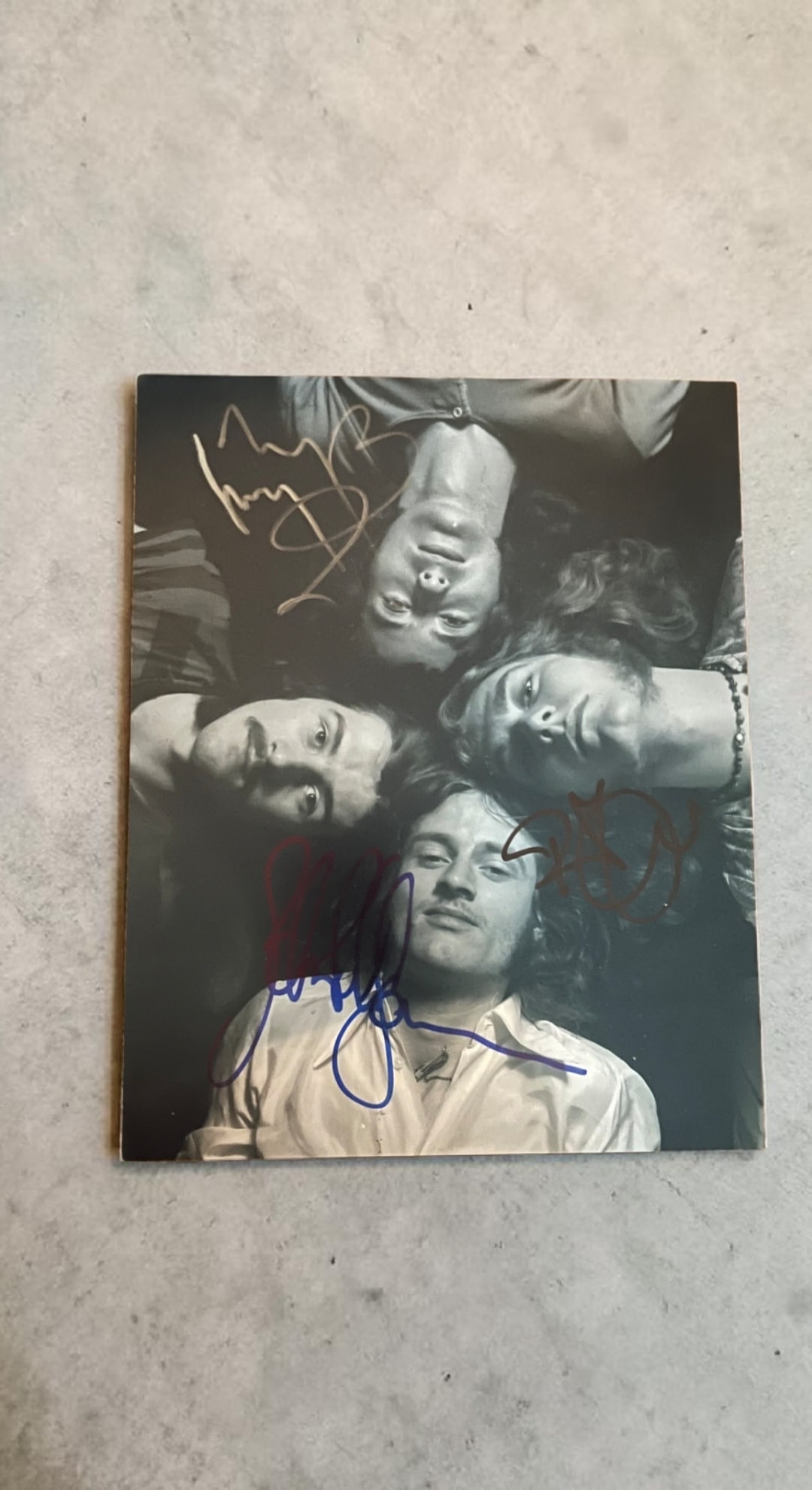 Led Zeppelin Signed Photograph: This lot is an 8x10" photograph, autographed by Robert Plant, Jimmy Page and John Paul Jones of Led Zeppelin. Item comes with third party authentication including interactive QR code, item details and