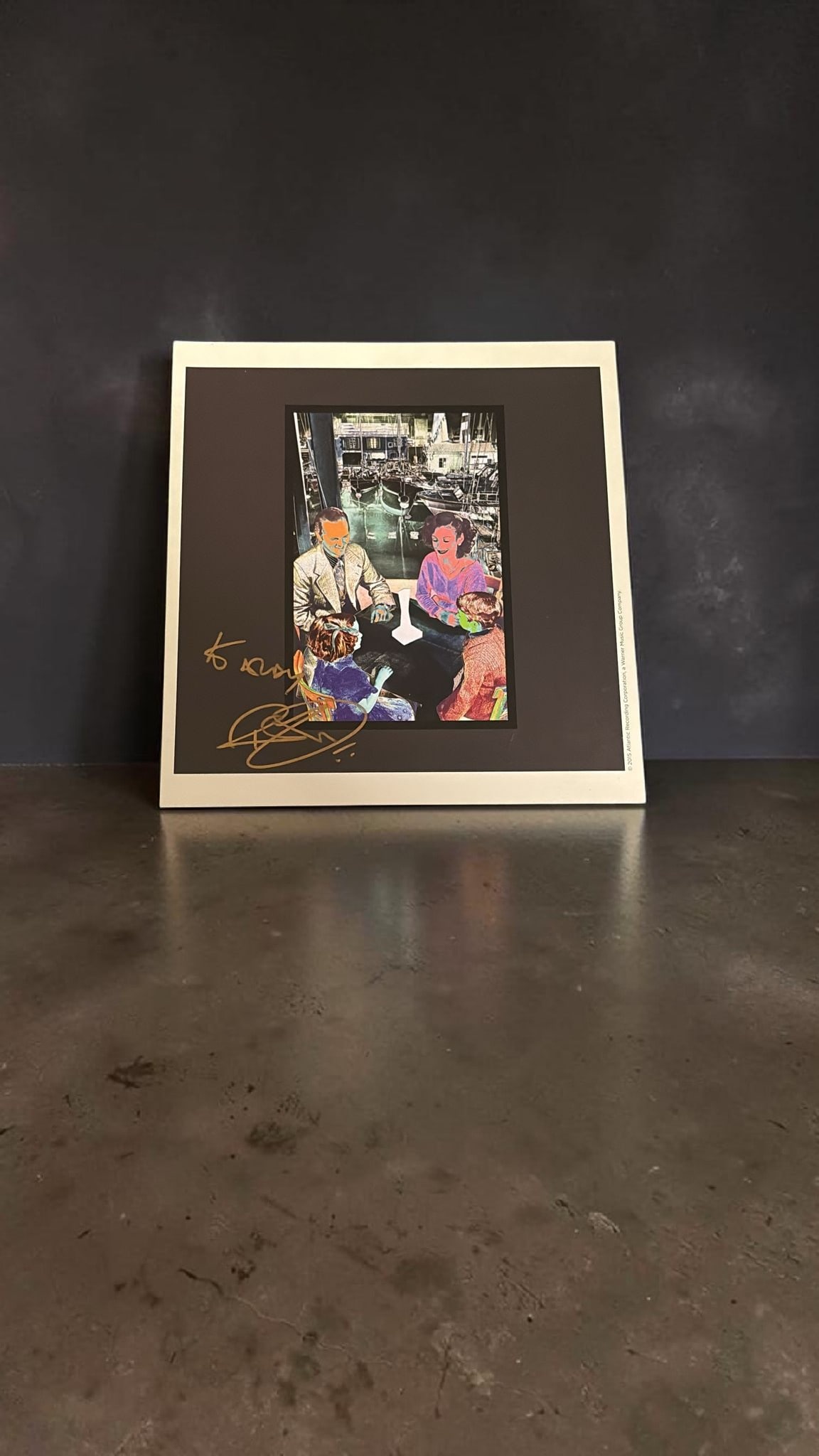 Robert Plant Led Zeppelin Signed Official Art Card: This lot is a 7x7" official art card from the album (Presence), from atlantic records, autographed by Robert Plant of Led Zeppelin. Item comes with third party authentication including interactive QR 