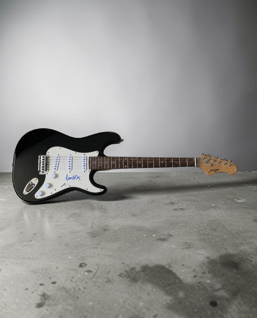 Damon Albarn Blur / Gorrillaz Signed Stratocaster Style Electric Guitar: This lot is a Stratocaster style electric guitar, autographed by Damon Albarn of Blur and the Gorillaz. If you wish to upgrade to a third party authentication with holographic QR code and item scoring