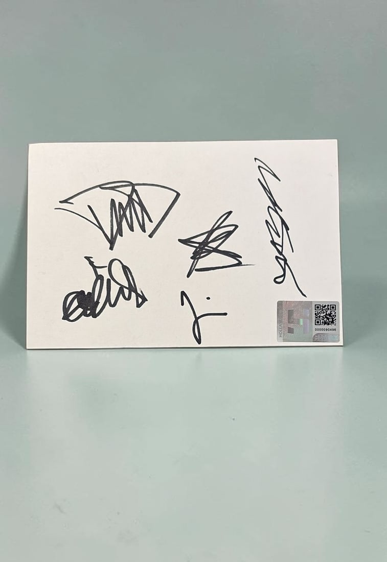 Foo Fighters Signed Card: This lot is a card, autographed by Dave Grohl, Chris Shiflett, Pat Smear, Taylor Hawkins and Nate Mendel of Foo Fighters. If you wish to upgrade to a third party authentication with holographic QR cod