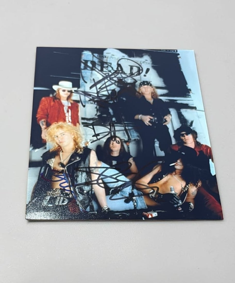 Guns N' Roses Signed Photograph: This lot is a 10x8" photograph, autographed by Matt Sorum, Axl Rose, Slash, Duff Mckagan and Izzy Stradlin of Guns N' Roses. If you wish to upgrade to a third party authentication with holographic QR 