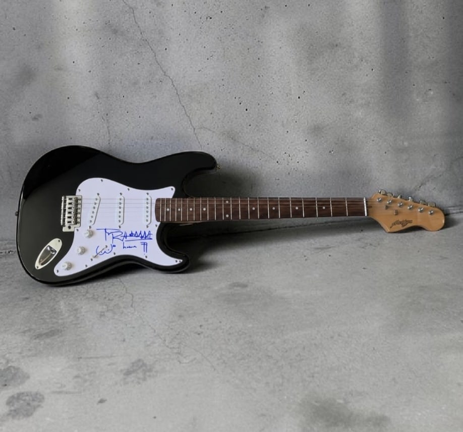 Johnny Rotten Sex Pistols Signed Electric Guitar: This lot is an electric guitar, autographed by Johnny Rotten of the Sex Pistols. If you wish to upgrade to a third party authentication with holographic QR code and item scoring, an additional charge 