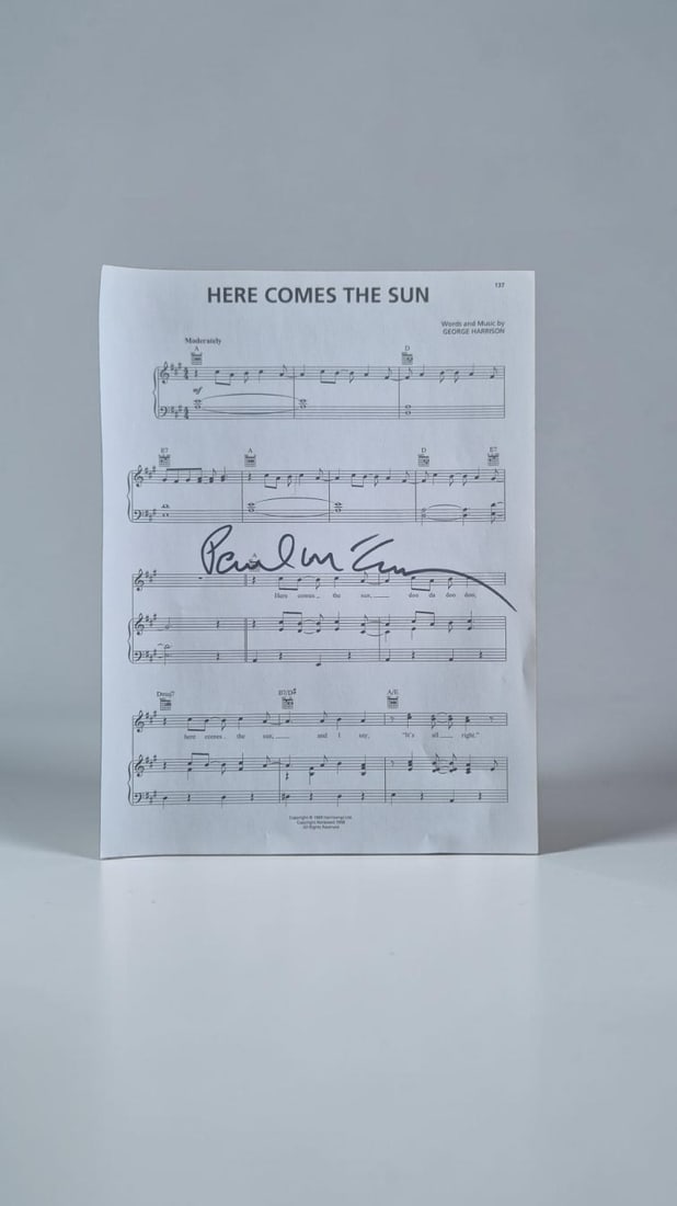 Paul McCartney The Beatles Signed Sheet Music: This lot is a page of sheet music (Here Comes The Sun), autographed by Paul McCartney of The Beatles. If you wish to upgrade to a third party authentication with holographic QR code and item scoring, 