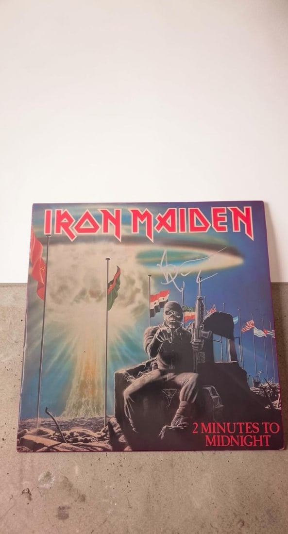 Bruce Dickinson Iron Maiden 2 Minutes To Midnight Signed 12" Vinyl: This lot is a 12" vinyl (2 Minutes To Midnight), autographed by Bruce Dickinson of Iron Maiden. If you wish to upgrade to a third party authentication with holographic QR code and item scoring, an add