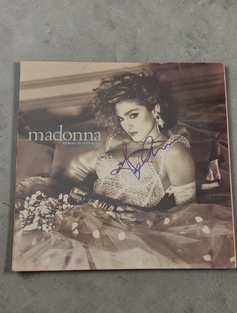 Madonna Like A Virgin Signed 12" Vinyl LP: This lot is a 12" vinyl LP (Like A Virgin), autographed by Madonna. If you wish to upgrade to a third party authentication with holographic QR code and item scoring, an additional charge of 30 UK Poun