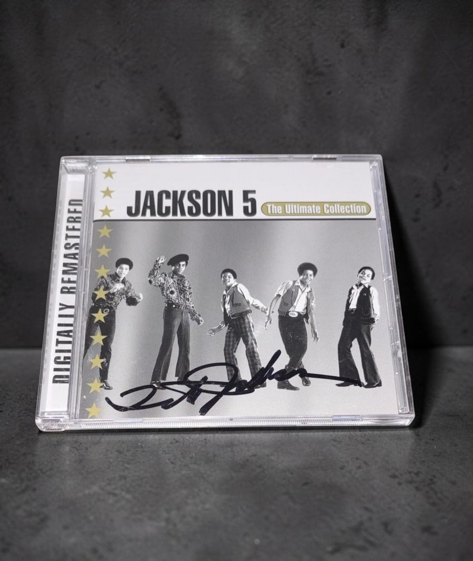 Tito Jackson Signed CD: This lot is a CD (Jackson 5, The Ultimate Collection), autographed by Tito Jackson. If you wish to upgrade to a third party authentication with holographic QR code and item scoring, an additional