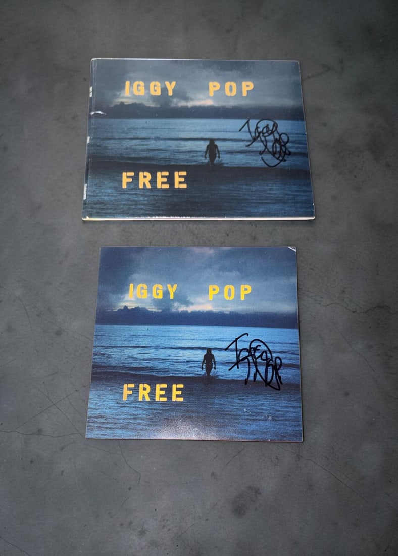 Iggy Pop Signed CD: This lot is a CD album (Free), with art card, official release, autographed by Iggy Pop. If you wish to upgrade to a third party authentication with holographic QR code and item scoring, an