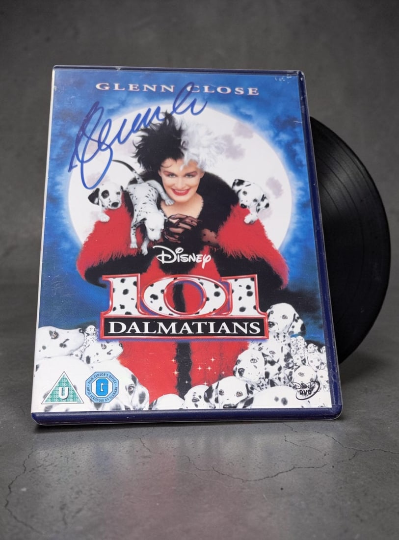 Glenn Close Signed Disney DVD: This lot is a Disney DVD (101 Dalmations), autographed by Glenn Close. If you wish to upgrade to a third party authentication with holographic QR code and item scoring, an additional charge of 30 UK