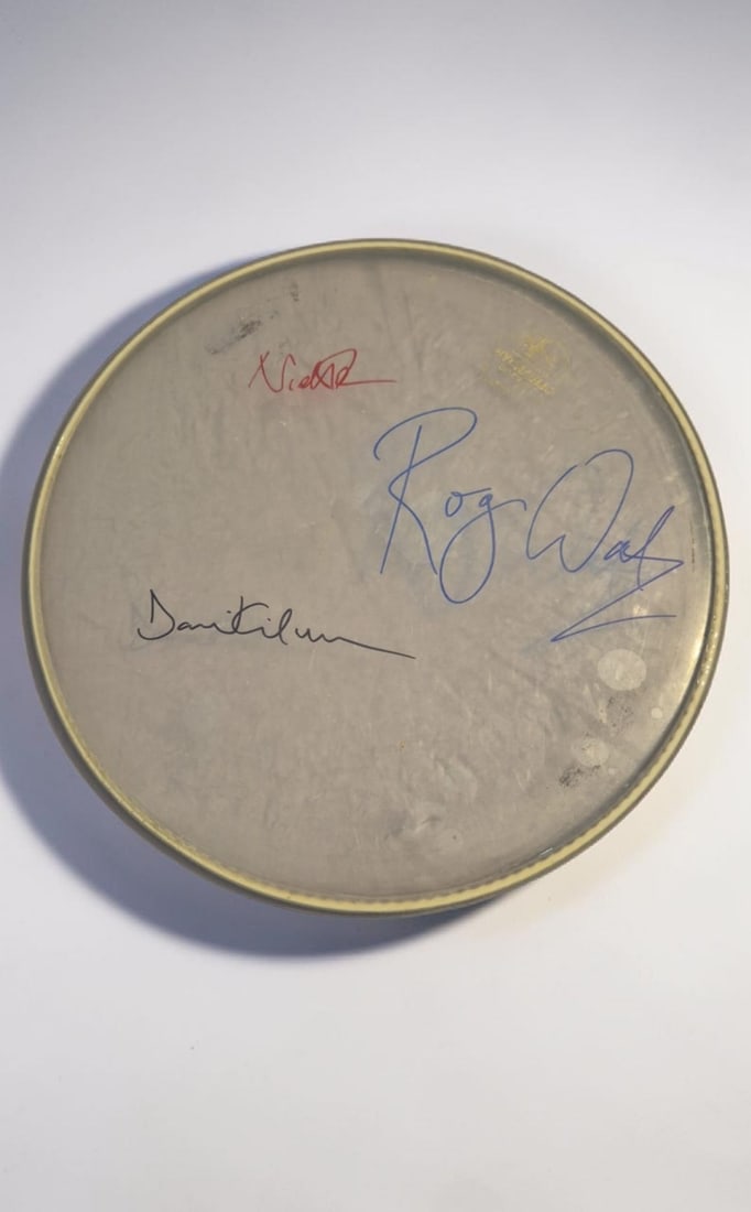 Pink Floyd Signed Drumskin: This lot is a drumskin, autographed by Roger Waters, Nick Mason and David Gilmour of Pink Floyd. If you wish to upgrade to a third party authentication with holographic QR code and item scoring, an