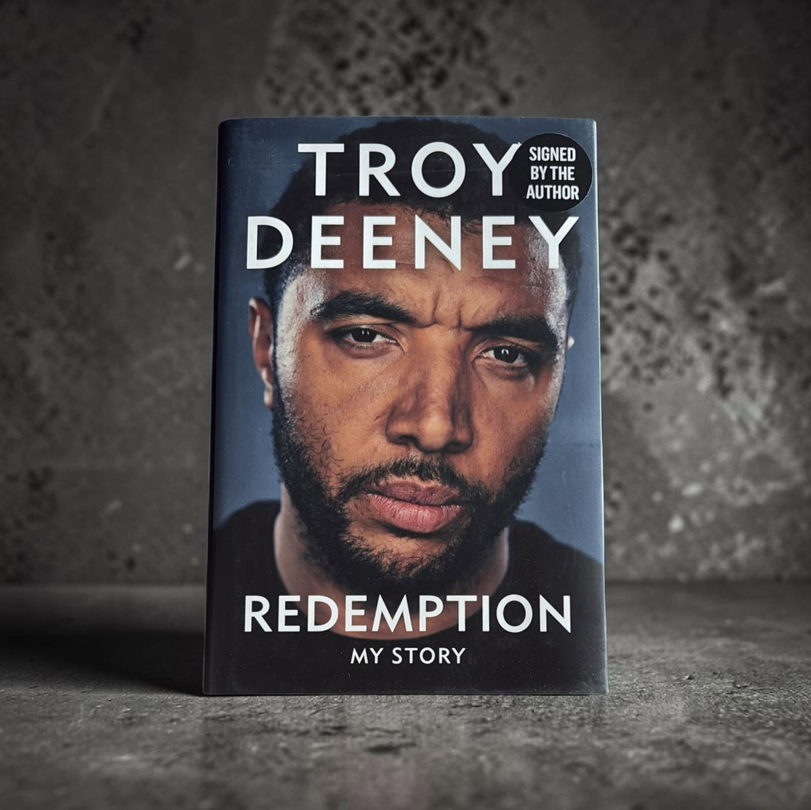 Troy Deeney Signed Hardback Book: This lot is a hardback book (Redemption), autographed by Troy Deeney. If you wish to upgrade to a third party authentication with holographic QR code and item scoring, an additional charge of 30 UK Po