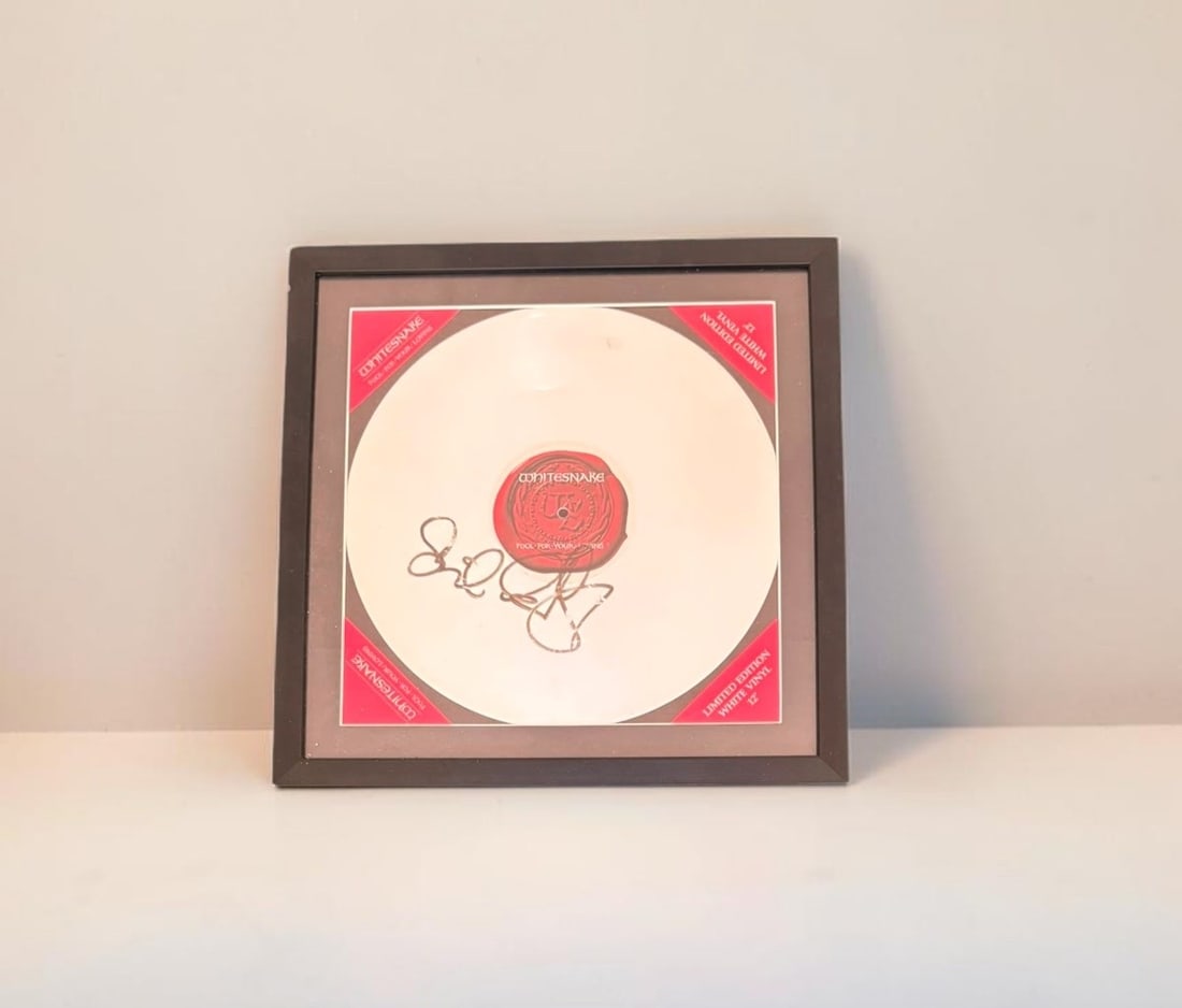 David Coverdale Whitesnake Signed Framed Vinyl LP: This lot is a limited edition Whitesnake vinyl LP (Fool For Your Loving), autographed by David Coverdale of Whitesnake. If you wish to upgrade to a third party authentication with holographic QR code