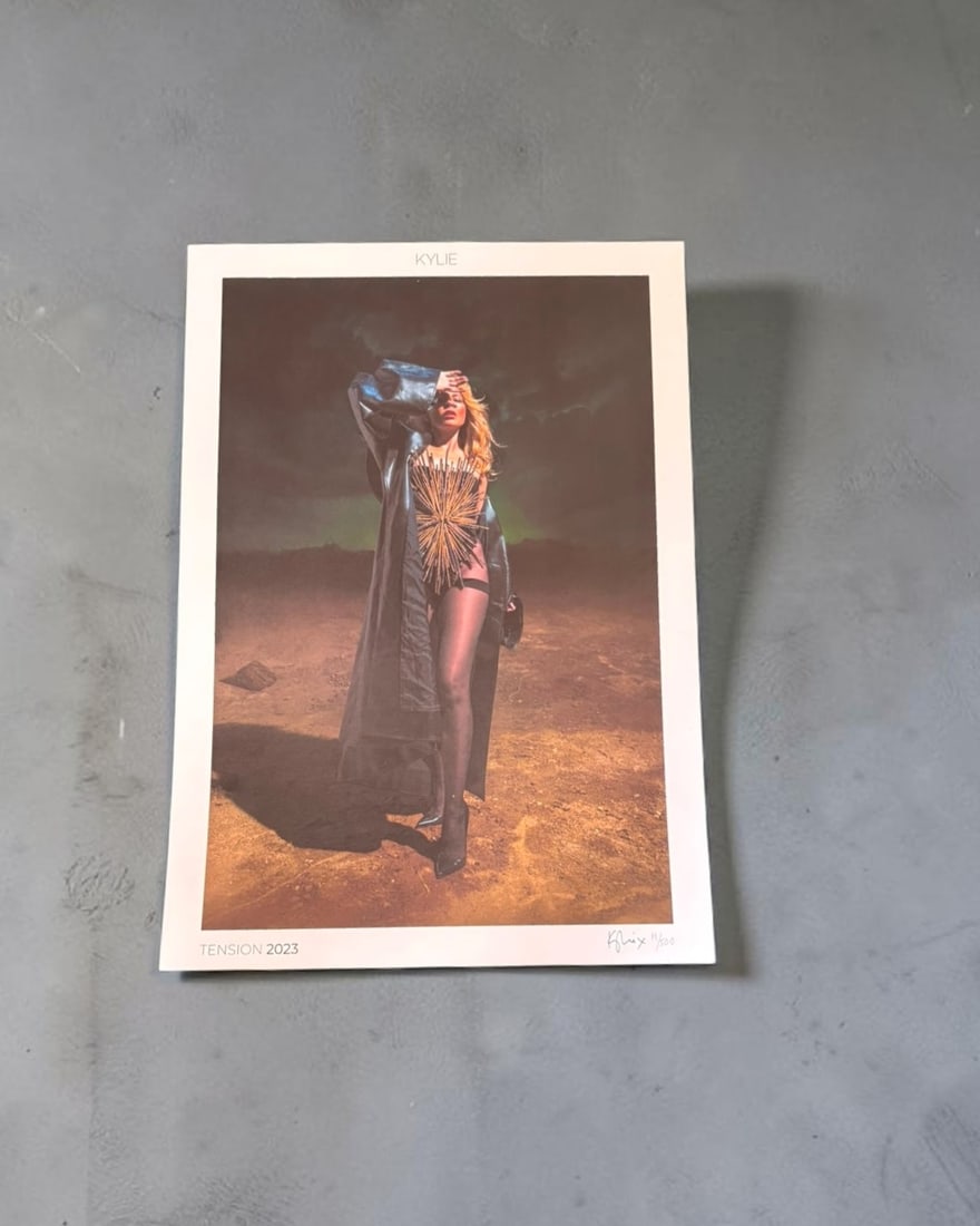 Kylie Minougue Signed Official Tension 2023 Lithograph: This lot is an official lithograph from the Kylie pop up shop in London, autographed by Kylie Minogue. Number 19/500. If you wish to upgrade to a third party authentication with holographic QR code