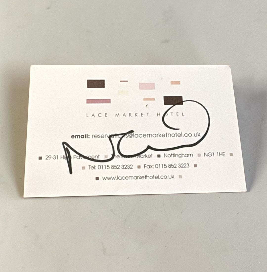 Noel Gallagher Oasis Signed Business Card: This lot is a business card (Lace Market Hotel, Nottingham), autographed by Noel Gallagher of Oasis. If you wish to upgrade to a third party authentication with holographic QR code and item scoring, a