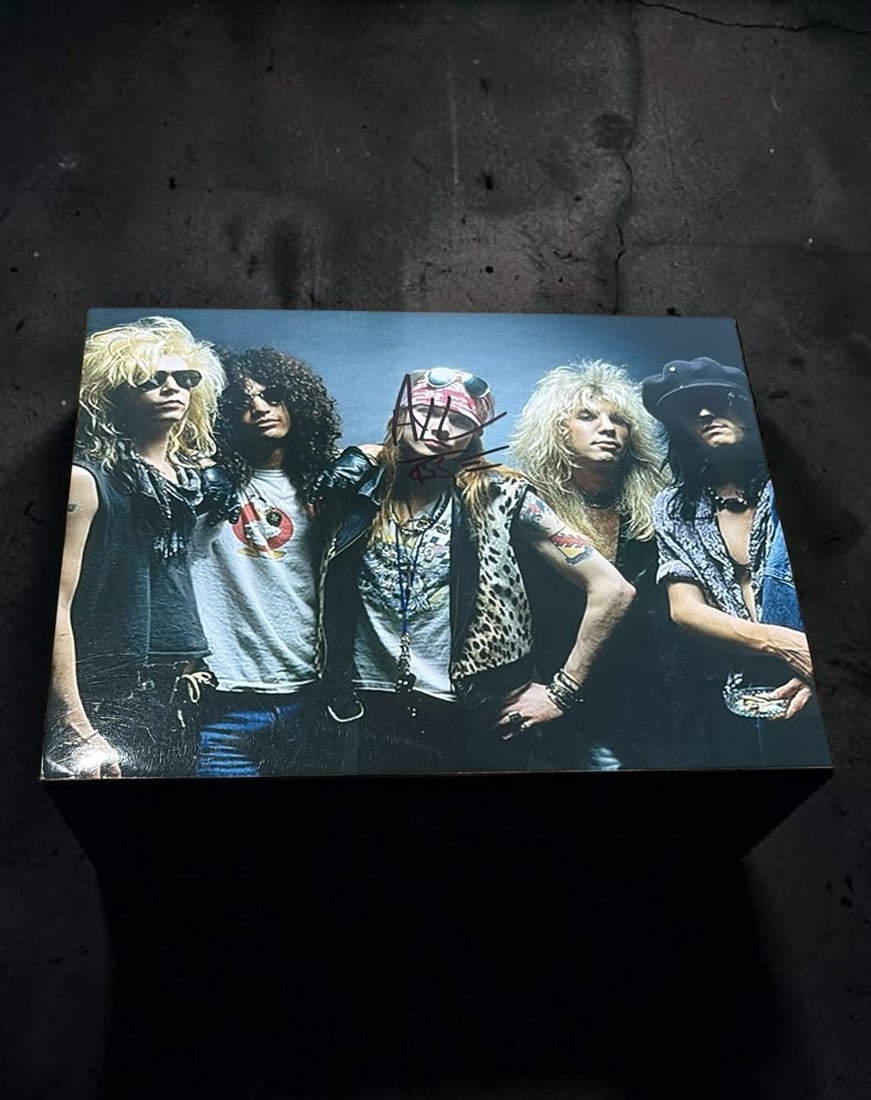 Axl Rose Guns N' Roses Signed Photograph: This lot is a 10x8" photograph, autographed by Axl Rose of Guns N' Roses. If you wish to upgrade to a third party authentication with holographic QR code and item scoring, an additional charge of 30 U