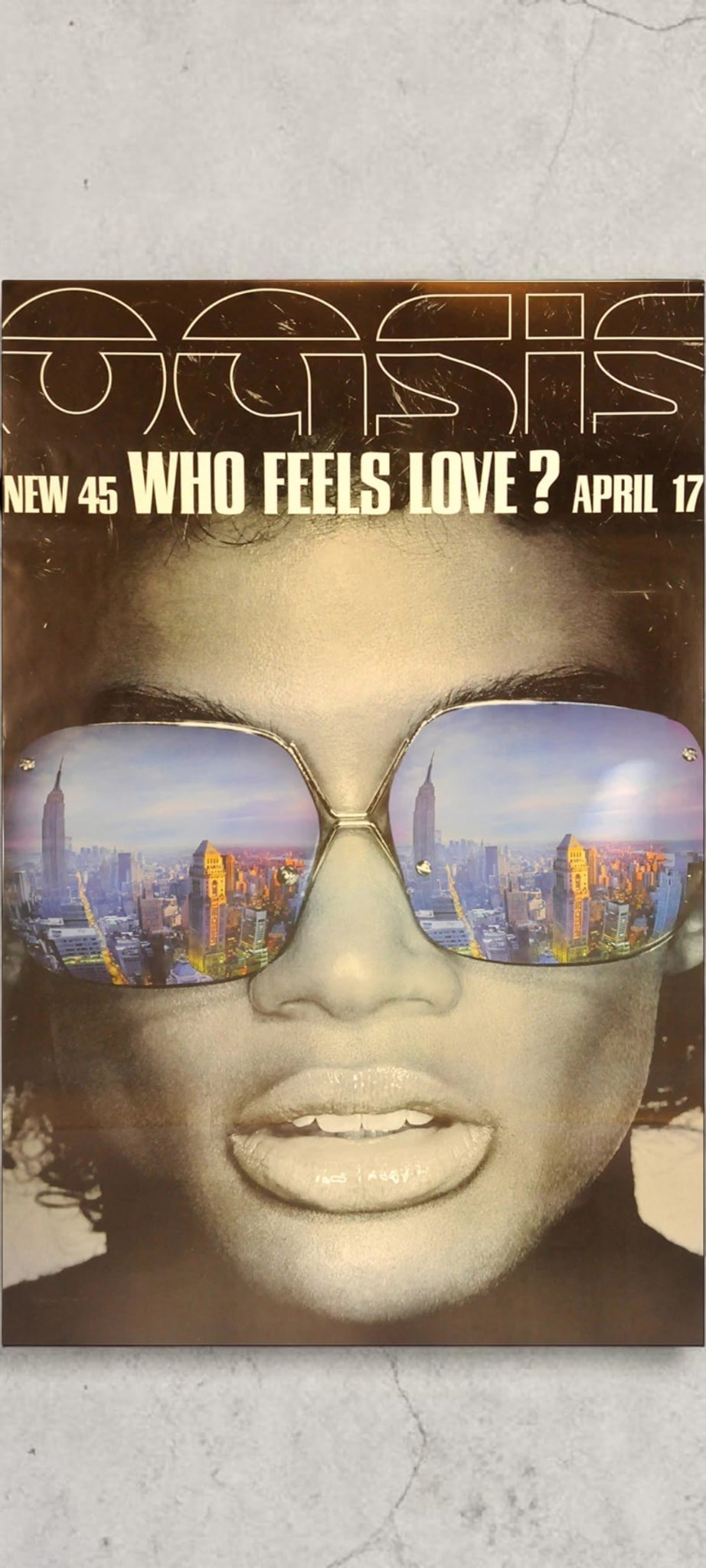 Oasis Original Promotional Poster: This lot is a 60x40" original (Oasis) litho-printed promotional poster in ashdel format for the single release (Who Feels Love). Item comes with COA guaranteeing the item as original for a lifetime.