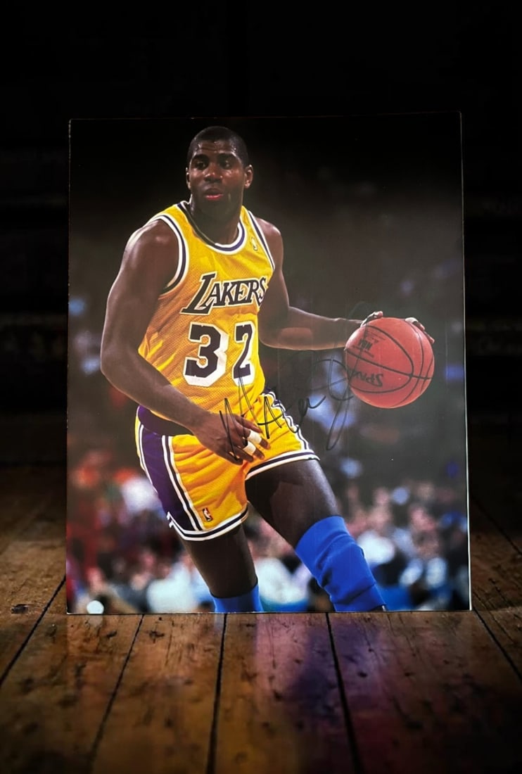 Magic Johnson Signed Photograph: This lot is an 8x10" photograph, autographed by Magic Johnson. If you wish to upgrade to a third party authentication with holographic QR code and item scoring, an additional charge of 30 UK Pound wou