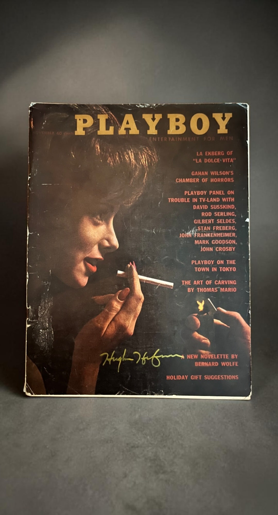 Hugh Hefner Signed Playboy Magazine: This lot is a Playboy magazine (November), autographed on the front of the cover by Hugh Hefner. If you wish to upgrade to a third party authentication with holographic QR code and item scoring, an ad