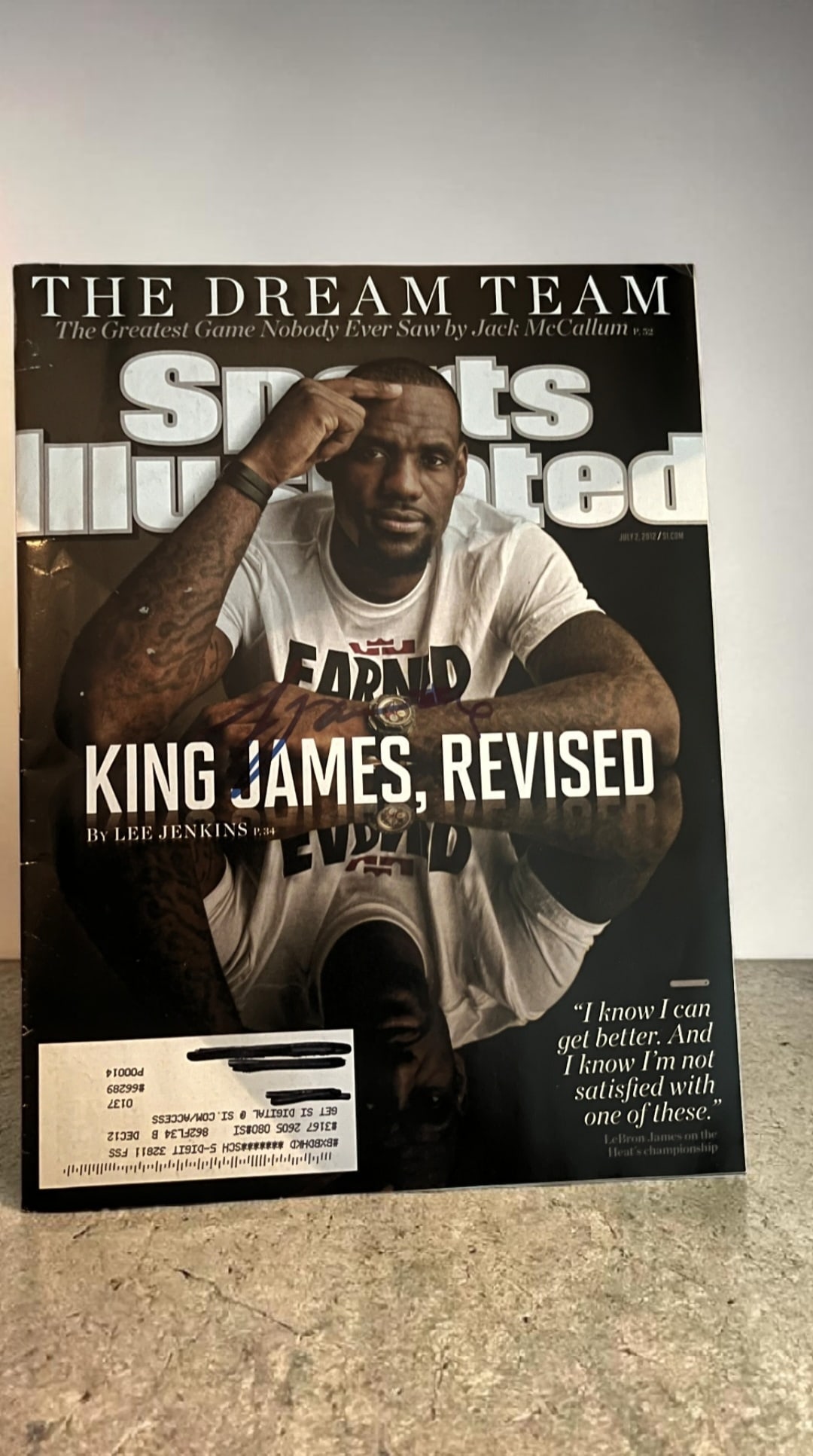 Lebron James Signed Sports Illustrated Magazine: This lot is a magazine (Sports Illustrated July 2nd 2012), autographed on the front cover by Lebron James. If you wish to upgrade to a third party authentication with holographic QR code and item scor