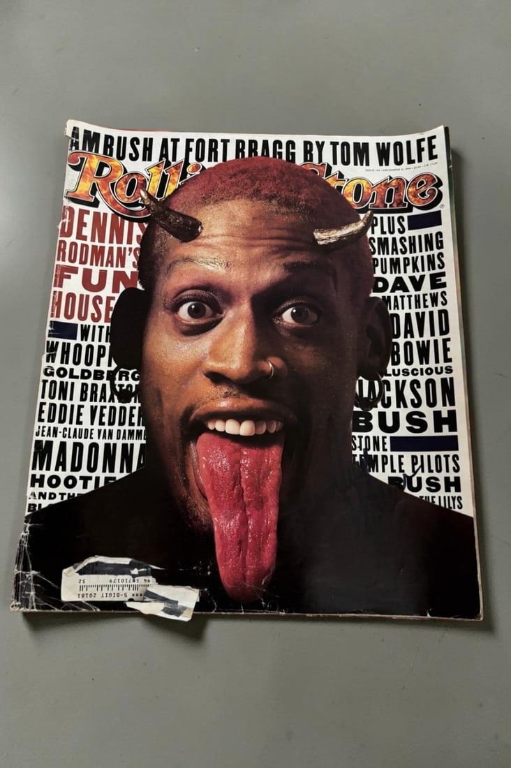 Dennis Rodman Signed Magazine: This lot is a Rolling Stones magazine (December), autographed on the front cover by Dennis Rodman. If you wish to upgrade to a third party authentication with holographic QR code and item scoring, an
