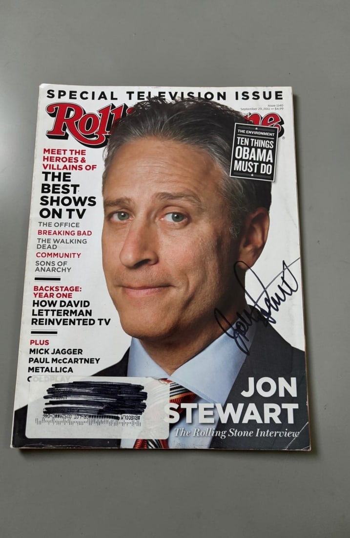 Jon Stewart Signed Magazine: This lot is a Rolling Stones magazine (September 2011), autographed on the front cover by Jon Stewart. If you wish to upgrade to a third party authentication with holographic QR code and item