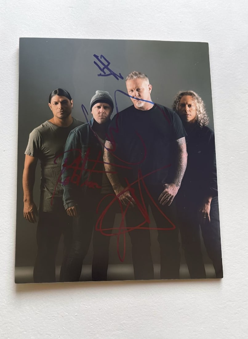 Metallica Signed Photograph: This lot is a 10x8" photograph, autographed by Kirk Hammett, James Hetfield, Lars Ulrich and Robert Trujillo of Metallica. If you wish to upgrade to a third party authentication with holographic QR