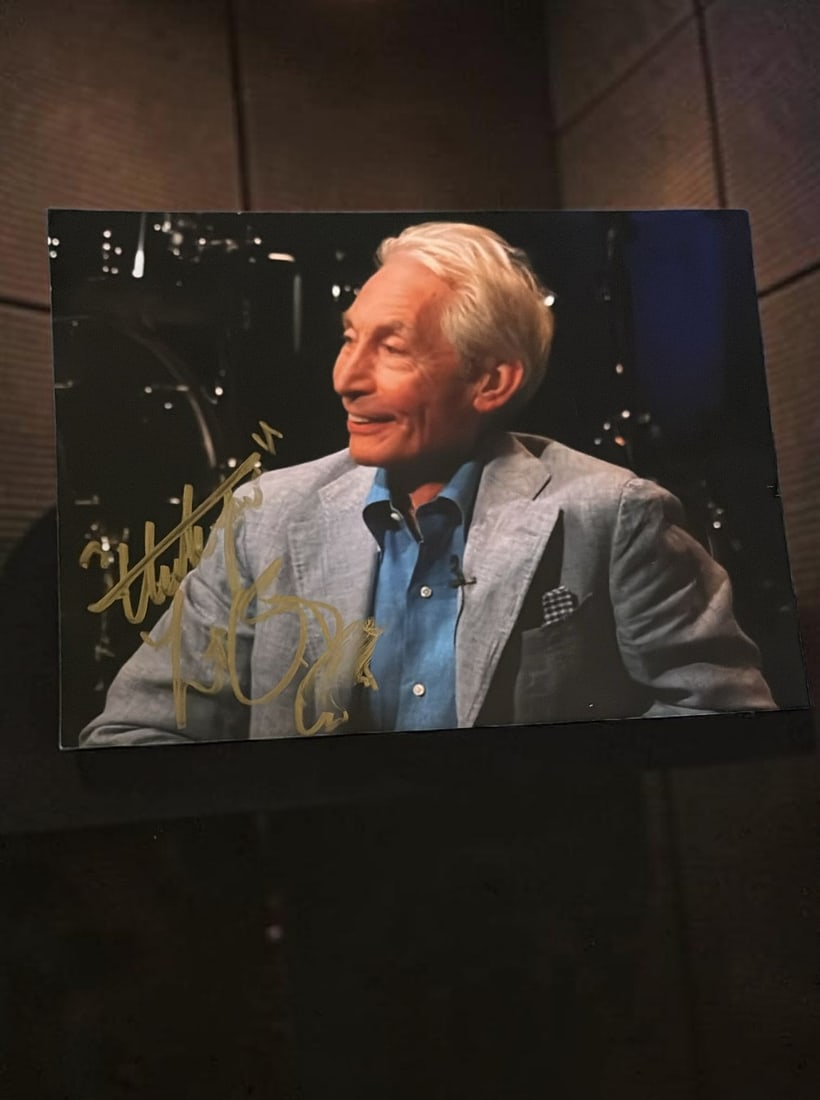 Charlie Watts The Rolling Stones Signed Photograph: This lot is a 7x5" photograph, autographed by Charlie Watts of The Rolling Stones. If you wish to upgrade to a third party authentication with holographic QR code and item scoring, an additional charg