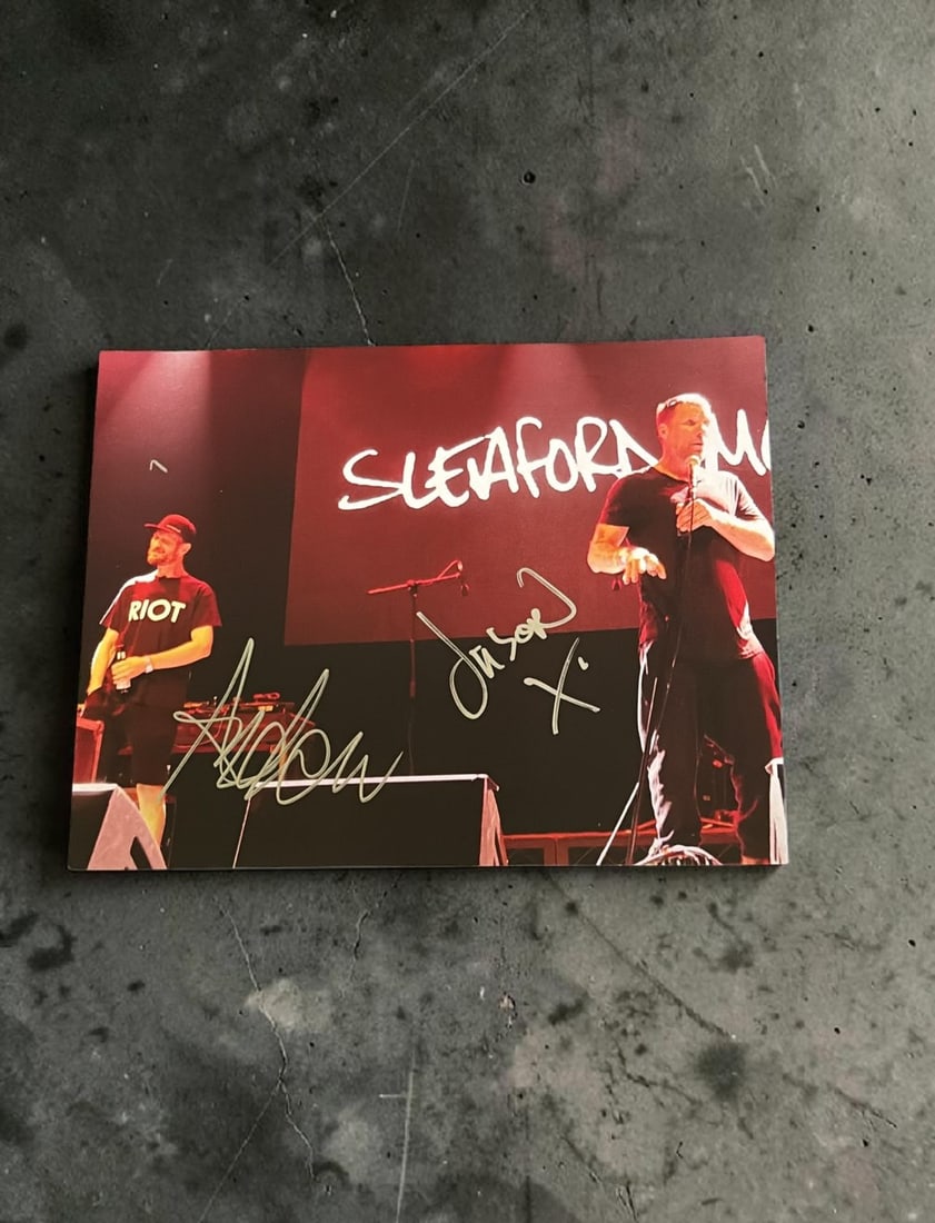 Sleaford Mods Signed Photograph: This lot is a 10x8" photograph, autographed by Jason Williamson and Andrew Fearn of the Sleaford Mods. If you wish to upgrade to a third party authentication with holographic QR code and item