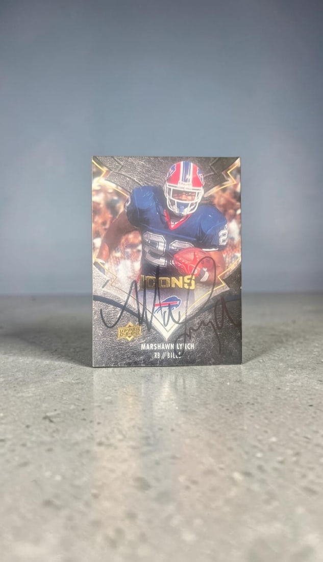 Marshawn Lynch Signed Upper Deck Icons Collectors Card: This lot is an Upper Deck (Icons) collectors card, autographed by Marshawn Lynch. If you wish to upgrade to a third party authentication with holographic QR code and item scoring, an additional charge
