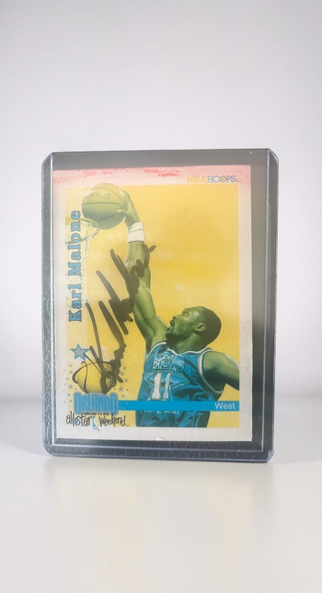 Karl Malone Signed Hoops Collectors Card: This lot is a Hoops collectors card, autographed by Karl Malone. If you wish to upgrade to a third party authentication with holographic QR code and item scoring, an additional charge of 30 UK Pound w