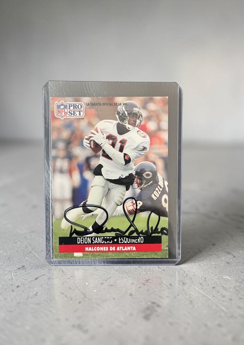 Deion Sanders Signed NFL Pro Set Collectors Card: This lot is an NFL Pro Set collectors card, autographed by Deion Sanders. If you wish to upgrade to a third party authentication with holographic QR code and item scoring, an additional charge of 30 U