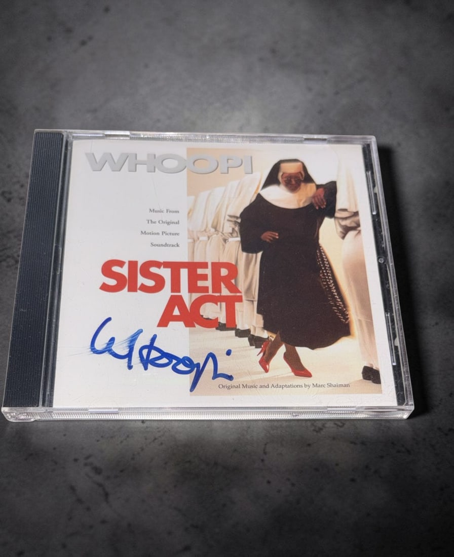 Whoopi Goldberg Signed Soundtrack From The Motion Picture Sister Act CD: This lot is a CD (Sister Act, Motion Picture Soundtrack), autographed by Whoopi Goldberg. If you wish to upgrade to a third party authentication with holographic QR code and item scoring, an additiona