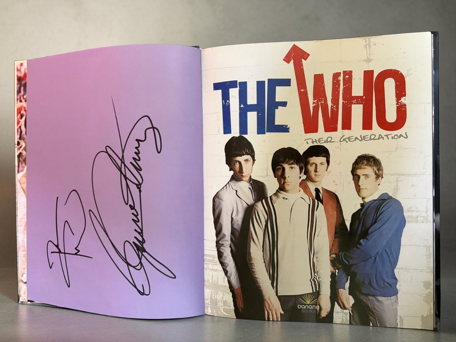 The Who Signed Hardback Book: This lot is a hardback book (The Who Their Generation), autographed by Pete Townshend and Roger Daltrey of The Who. If you wish to upgrade to a third party authentication with holographic QR code and