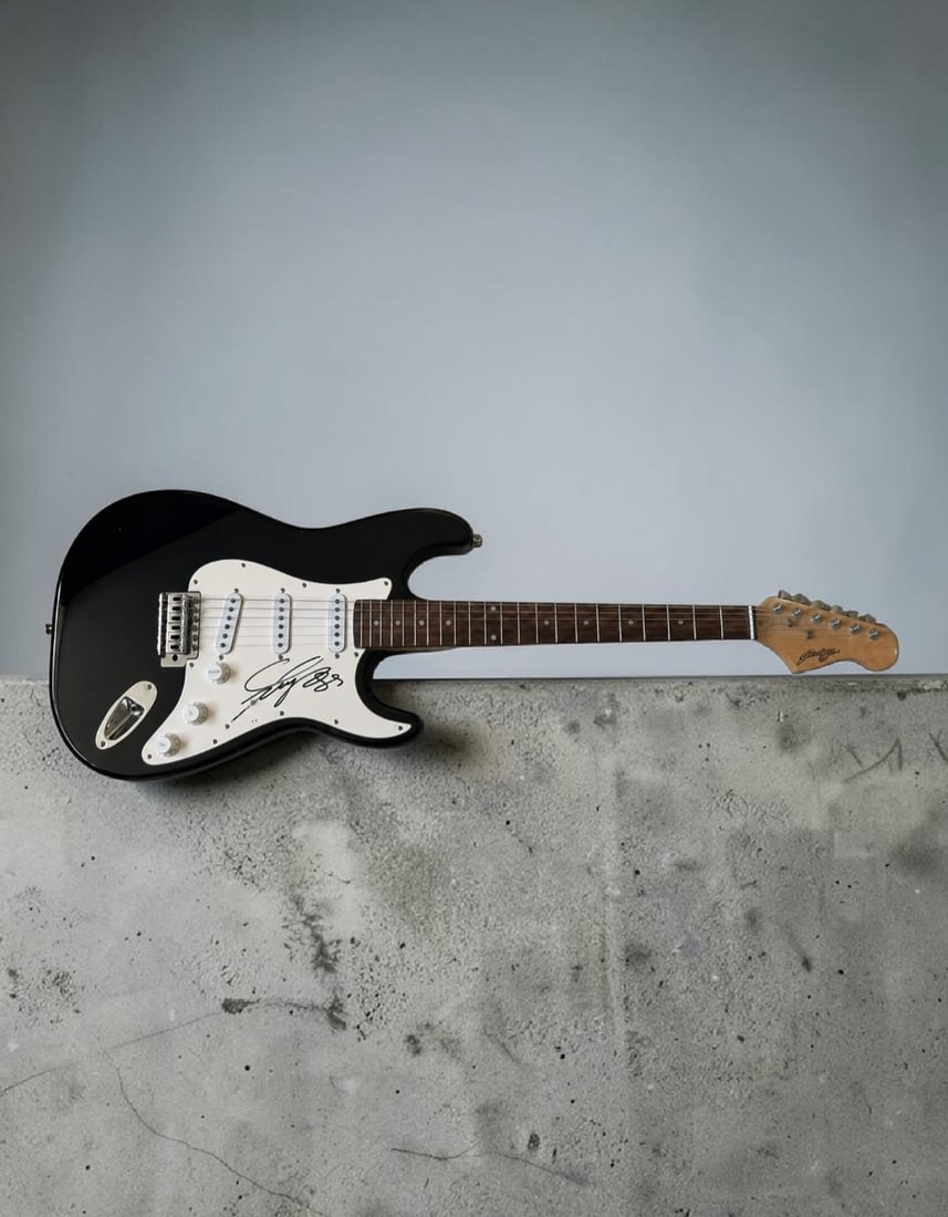 Francis Rossi Status Quo Signed Stratocaster Style Electric Guitar ACOA Authenticated: This lot is a Stratocaster style electric guitar, autographed by Francis Rossi of Status Quo. Item comes with ACOA authentication. If you wish to upgrade to a third party authentication with