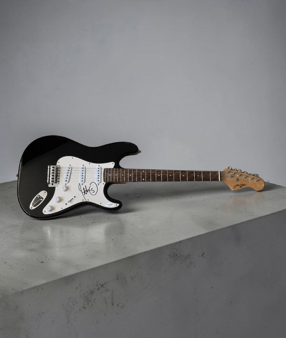 John 5 Motley Crew Signed Stratocaster Style Electric Guitar ACOA Authenticated: This lot is a Stratocaster style electric guitar, autographed by John 5 of the Motley Crew. Item comes with ACOA authentication. If you wish to upgrade to a third party authentication with holographic