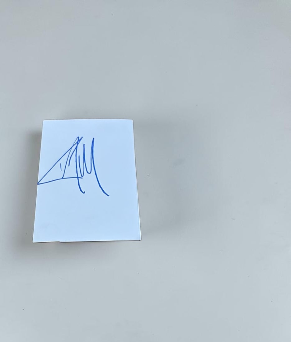 Liam Gallagher Oasis Signed Card: This lot is a card, autographed by Liam Gallagher of Oasis. If you wish to upgrade to a third party authentication with holographic QR code and item scoring, an additional charge of 30 UK Pound would 