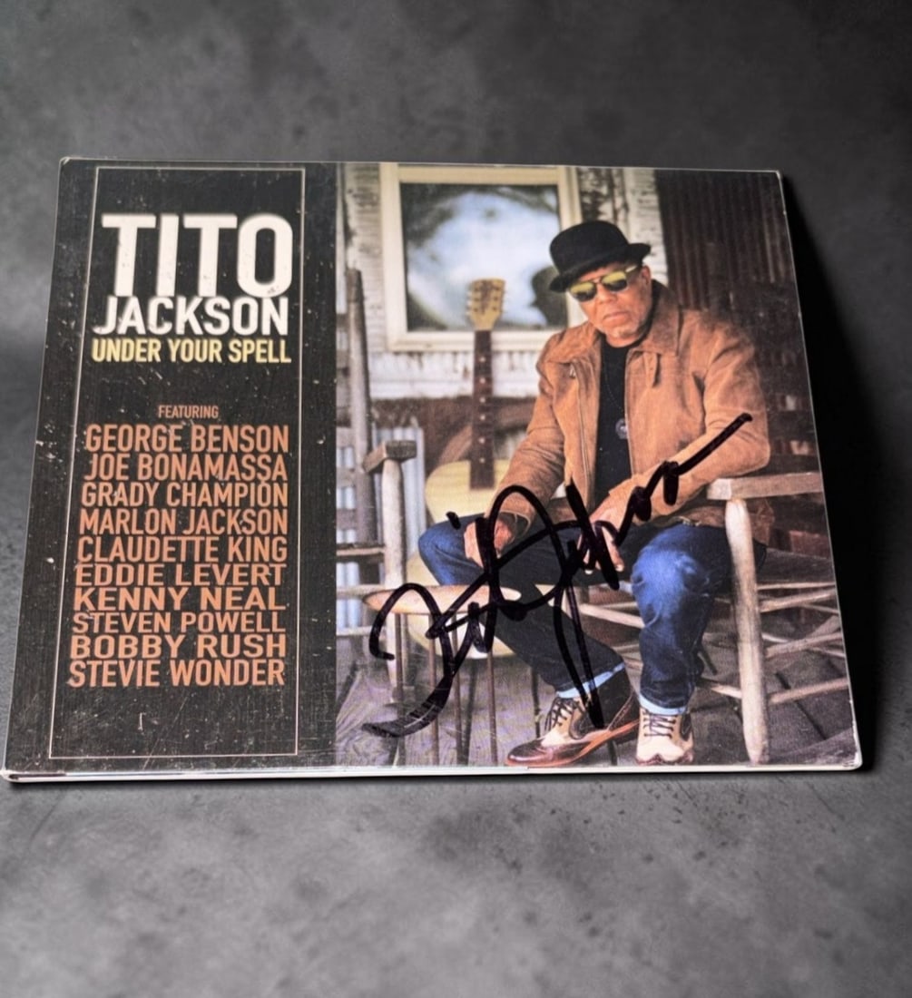 Tito Jackson Signed CD: This lot is a CD Album (Under Your Spell), autographed by Tito Jackson. If you wish to upgrade to a third party authentication with holographic QR code and item scoring, an additional charge of 30 UK 