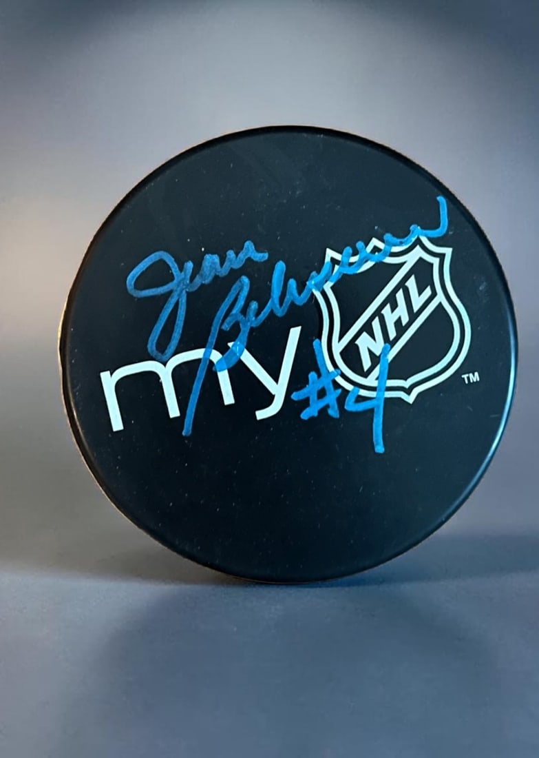 Jean Beliveau Signed Hockey Puck: This lot is a hockey puck, autographed by Jean Beliveau. If you wish to upgrade to a third party authentication with holographic QR code and item scoring, an additional charge of 30 UK Pound would be 