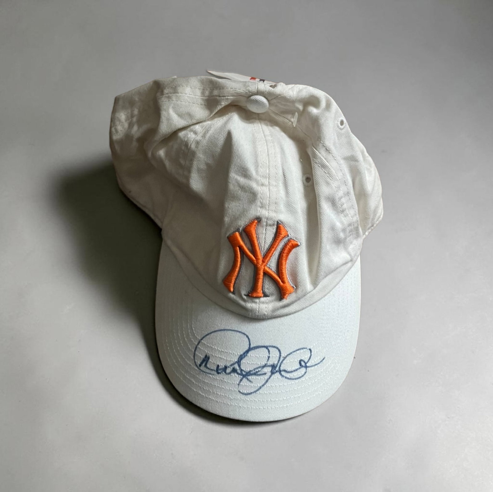 Derek Jeter Signed NY Yankees Hat: This lot is a NY Yankees hat, autographed on the peak of the hat by Derek Jeter. If you wish to upgrade to a third party authentication with holographic QR code and item scoring, an additional charge 
