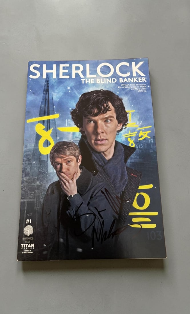 Mark Gatiss And Steven Moffat Signed Sherlock Comic: This lot is a Sherlock comic (The Blind Banger), autographed on the front of the comic by Mark Gatiss and Steven Moffat. If you wish to upgrade to a third party authentication with holographic QR code