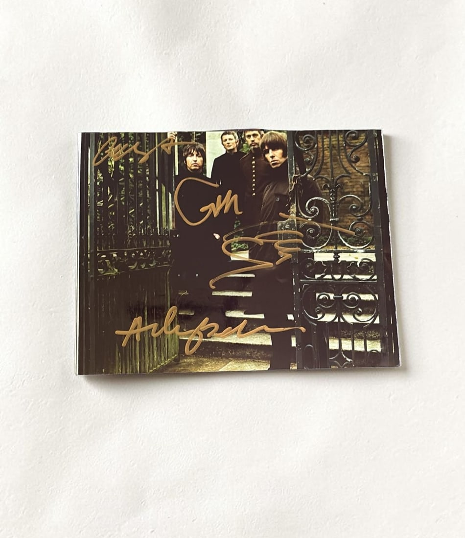 Beady Eye Signed Photograph: This lot is a 10x8" photograph, autographed by Liam Gallagher, Andy Bell, Gem Archer and Chris Sharrock of Beady Eye. If you wish to upgrade to a third party authentication with holographic QR code an