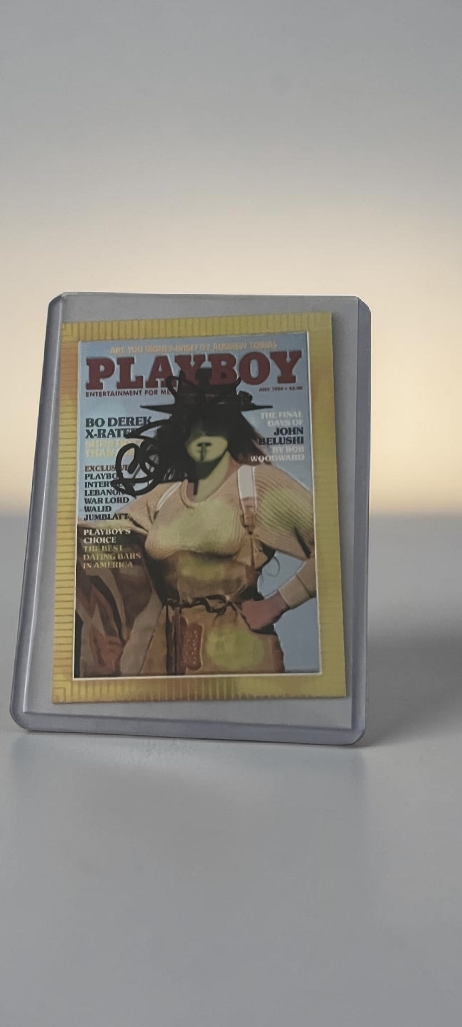 Bo Derek Signed Playboy Chromium Collectors Card: This lot is a Playboy chromium collectors card (July 1984), autographed on the front of the card by Bo Derek. If you wish to upgrade to a third party authentication with holographic QR code and item s