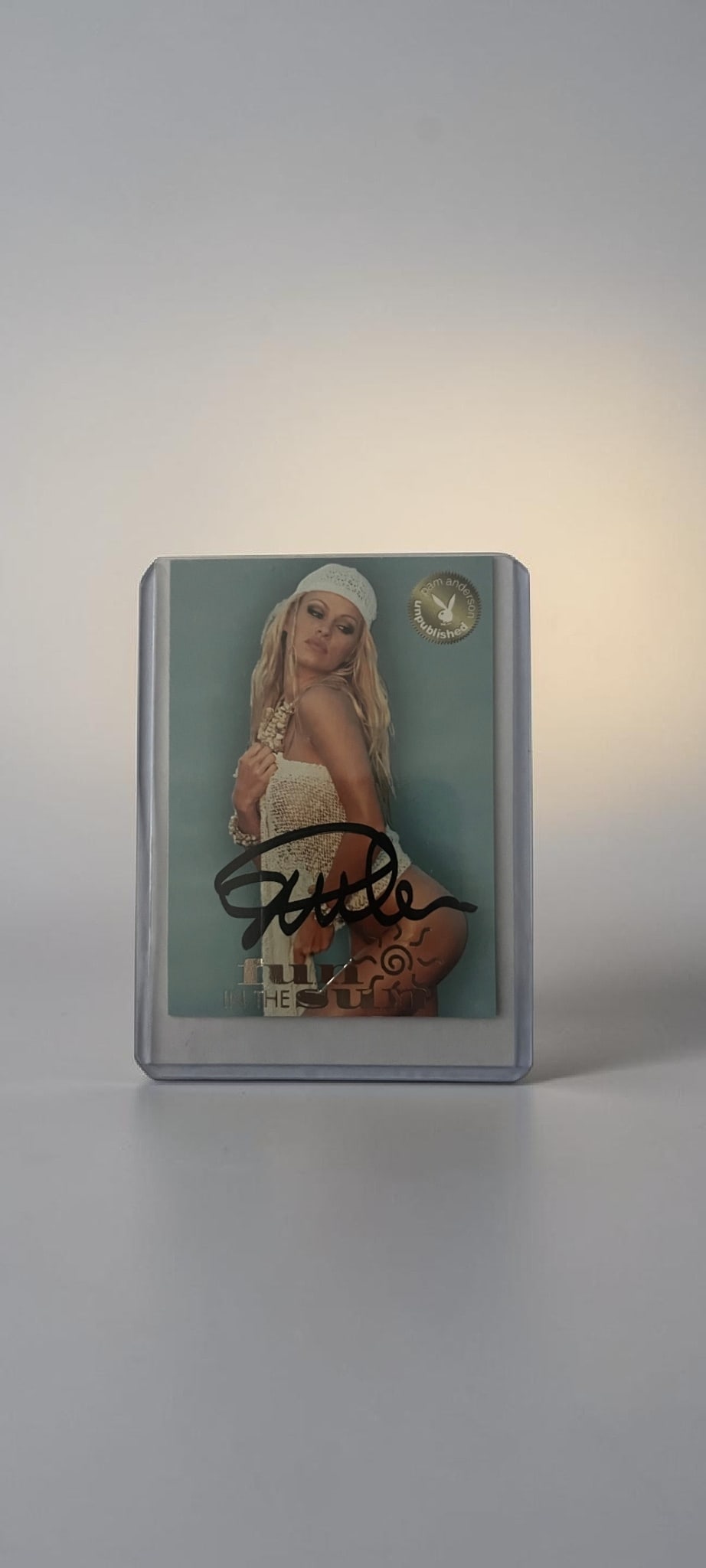 Pamela Anderson Signed Playboy Collectors Card: This lot is a Playboy collectors card (Pamwatch Photo Shoot November 1994), autographed on the front of the card by Pamela Anderson. If you wish to upgrade to a third party authentication with