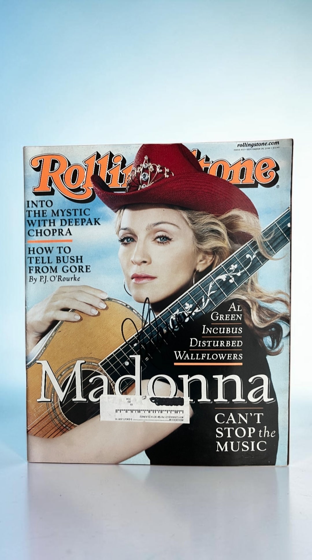 Madonna Signed Rolling Stones Magazine: This lot is a Rolling Stones Magazine (September 2000), autographed on the front of the magazine by Madonna. If you wish to upgrade to a third party authentication with holographic QR code and item sc