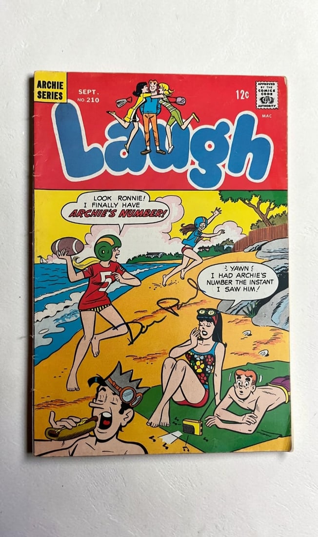 Dan Parent Signed Archie Comic: This lot is an Archie Comic (September, number 210), autographed on the front of the comic by Dan Parent. If you wish to upgrade to a third party authentication with holographic QR code and item scori