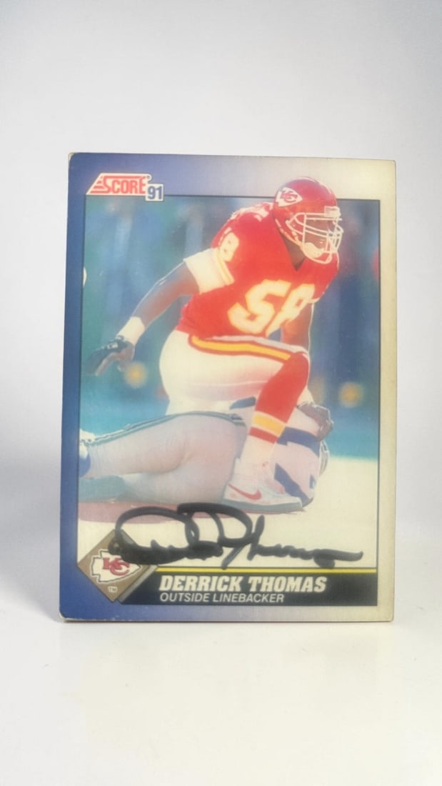 Derrick Thomas Signed Score 91 Collectors Card: This lot is a Score 91 collectors card, autographed by Derrick Thomas. If you wish to upgrade to a third party authentication with holographic QR code and item scoring, an additional charge of 30 UK P