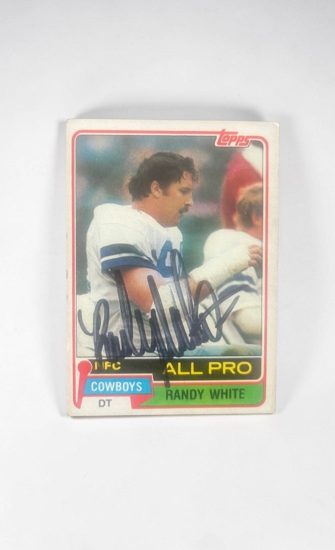 Randy White Signed Topps Collectors Card: This lot is a Topps collectors card, autographed by Randy White. If you wish to upgrade to a third party authentication with holographic QR code and item scoring, an additional charge of 30 UK Pound w