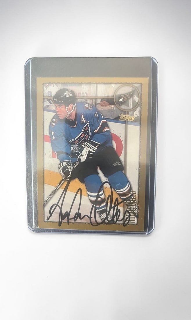 Adam Oates Signed Topps Collectors Card: This lot is a Topps collectors card, autographed by Adam Oates. If you wish to upgrade to a third party authentication with holographic QR code and item scoring, an additional charge of 30 UK Pound wo