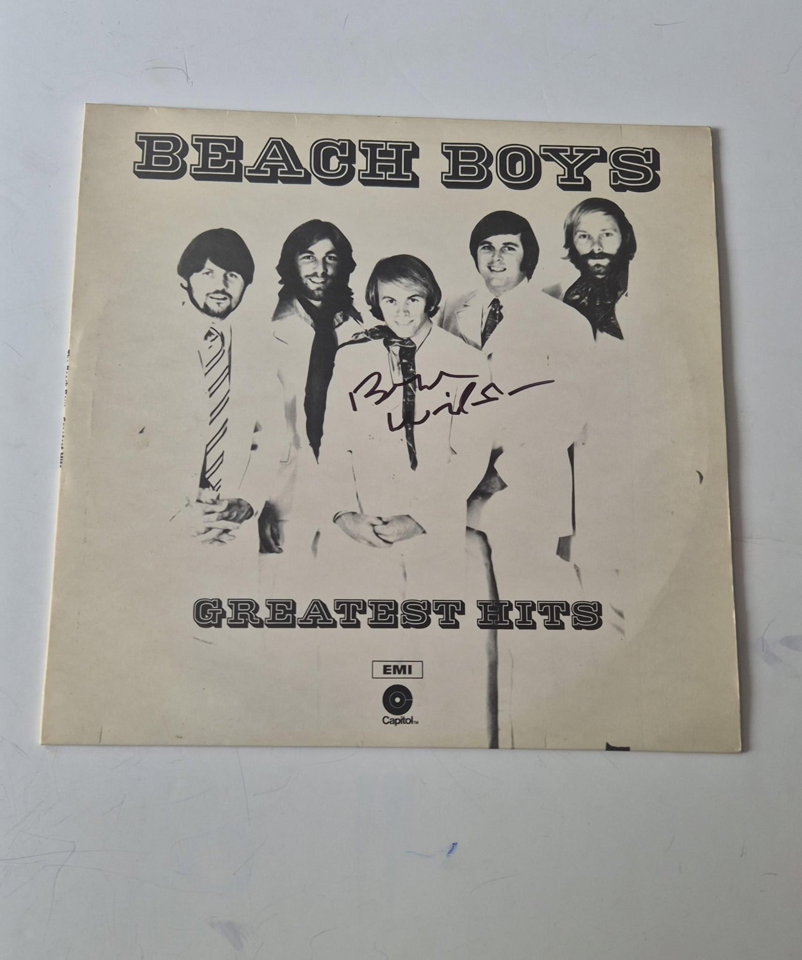 Brian Wilson The Beach Boys Greatest Hits Signed Vinyl LP: This lot is a vinyl LP (Greatest Hits), autographed by Brian Wilson of The Beach Boys. If you wish to upgrade to a third party authentication with holographic QR code and item scoring, an additional c