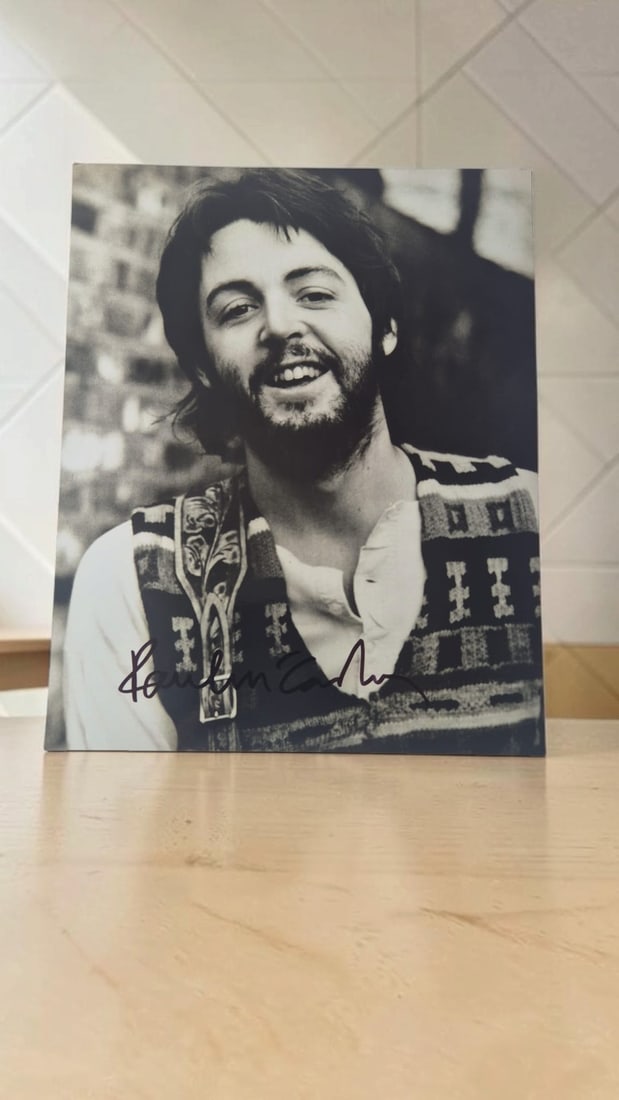 Paul McCartney The Beatles Signed Photograph: This lot is a photograph, autographed by Paul McCartney of The Beatles. If you wish to upgrade to a third party authentication with holographic QR code and item scoring, an additional charge of 30 UK 